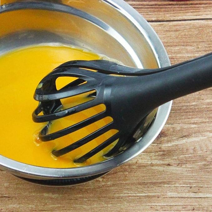 Egg beater and food clip in one